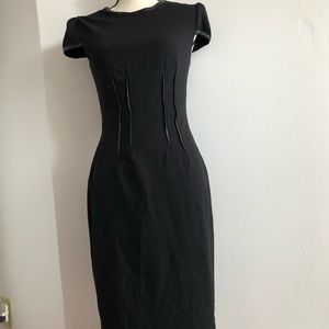 Betsy Johnson black crepe dress, size 2, leather detail.